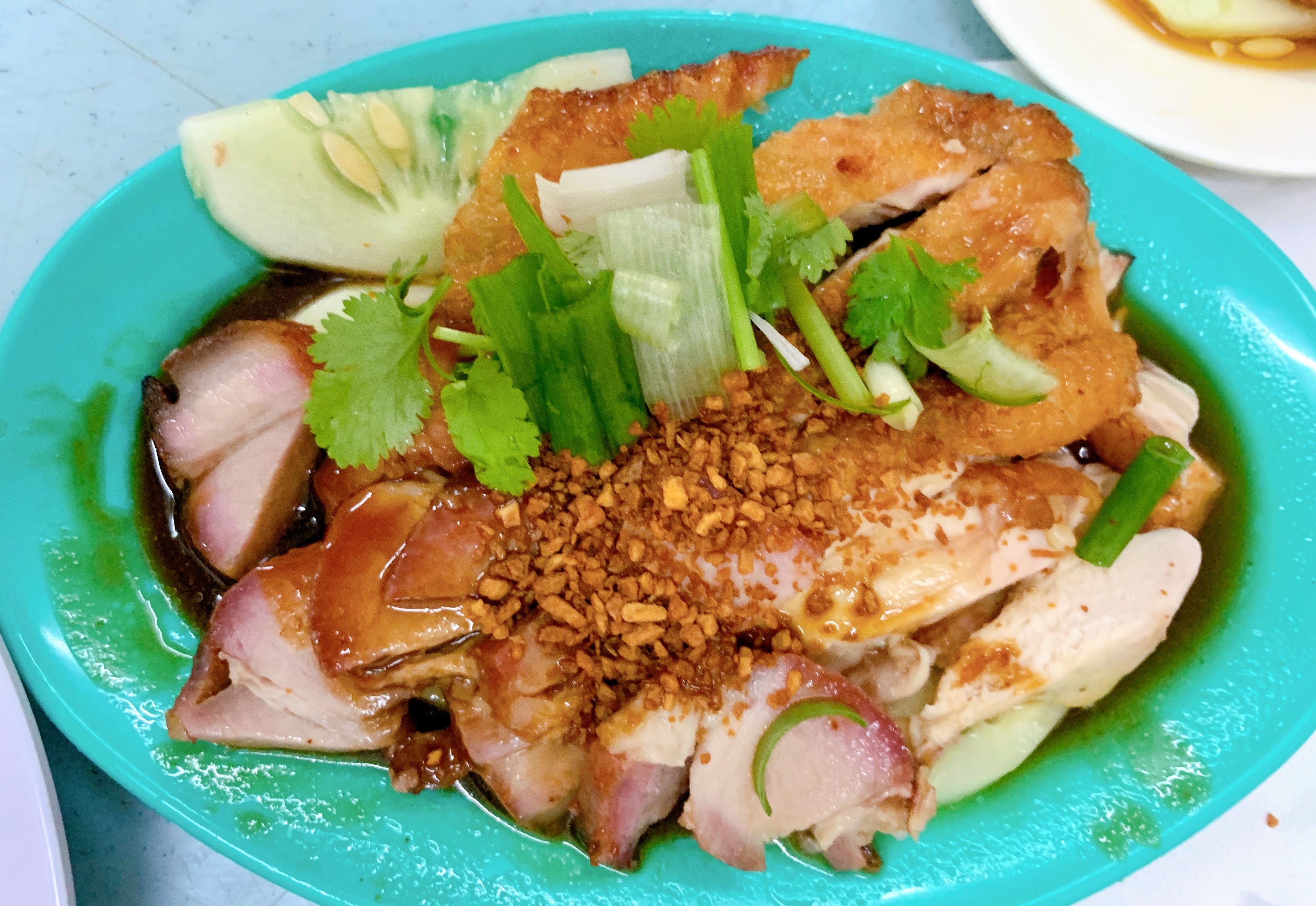 A plate of sliced roasted chicken